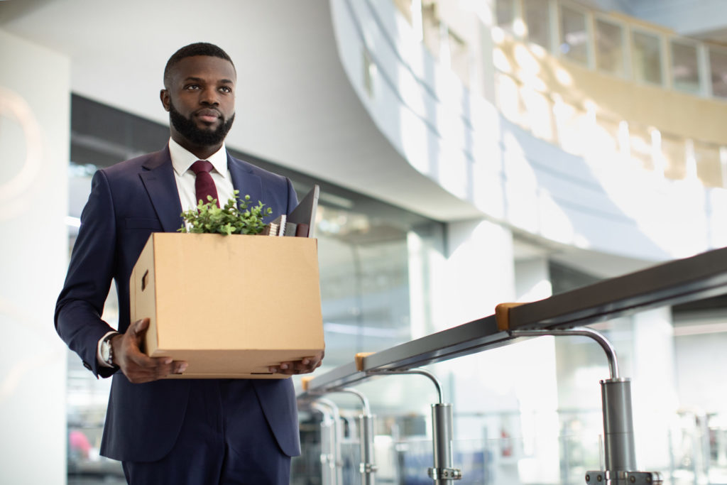 man-walking-with-a-box