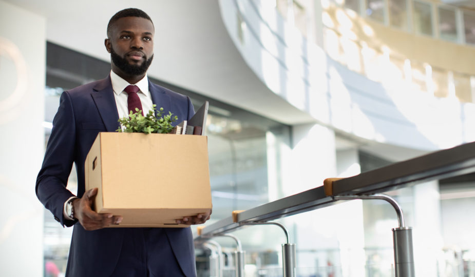 man-walking-with-a-box