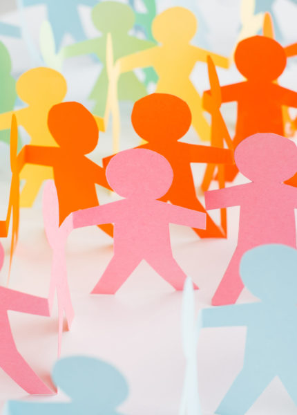 colorful paper cut chain people on white, human rights concept