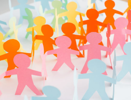 colorful paper cut chain people on white, human rights concept